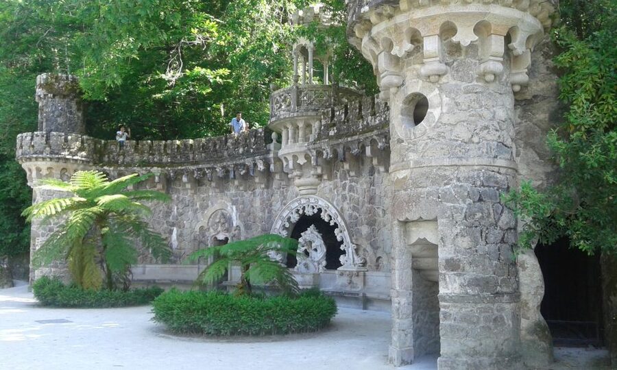 Sintra: Quinta da Regaleira Entry Ticket and Guided Tour - Inside the palace: Gothic design tied to alchemy themes
