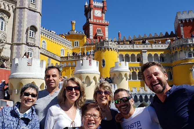 Sintra to Cascais: 2 Palaces, 4 Sites, Small Group 10 Hour Tour - Sintra Photo Stops: National Palace Exterior and the Castle of the Moors Vibe