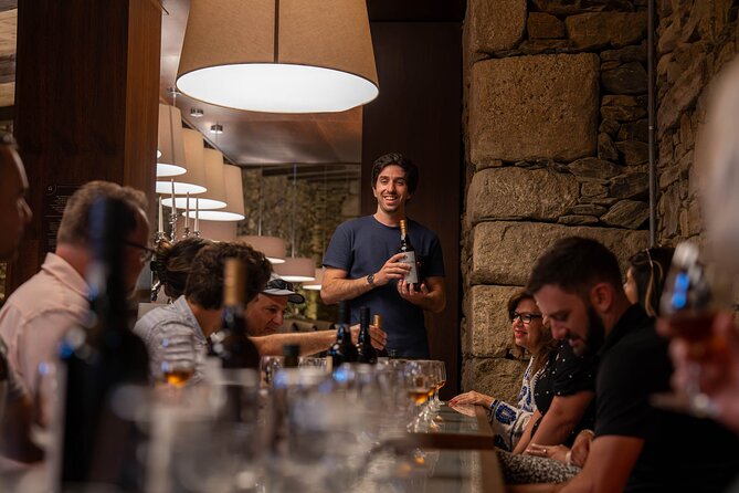 Small Group Douro Valley Wine Tour with Lunch and Cruise - First premium winery: guided tour and three-wine tasting