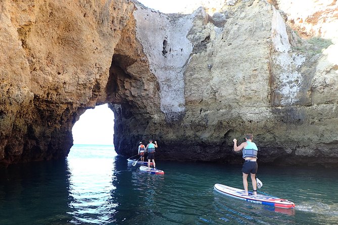 Sunrise SUP Caves Tour in Lagos – Small Group Experience - Arches, tunnels, and the Love Cave stop on the way back