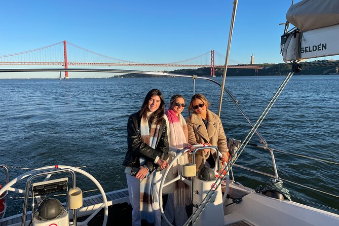 Sunset Boat Tour in Lisbon with Wine - Under Ponte 25 de Abril, plus Terreiro do Paço from the river