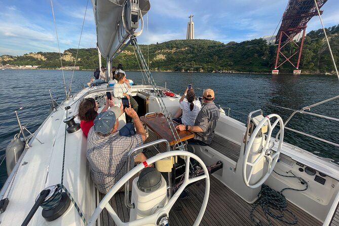 Sunset Boat Tour in Lisbon with Wine - Cristo Rei from the Tagus, and the calm shift toward the south bank