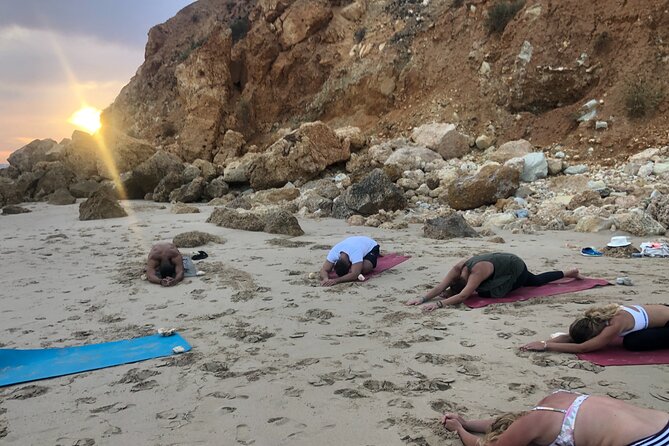 Sunset Yoga at Lagos's beautiful beach by el Sol Lifestyle - Why Praia de Porto Mós Makes Sunset Yoga Special