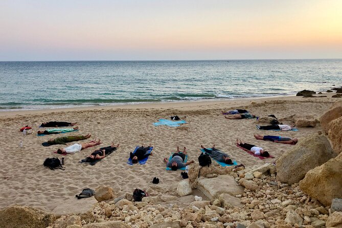 Sunset Yoga at Lagos's beautiful beach by el Sol Lifestyle - Sand, Balance, and the Moderate Fitness Level Requirement