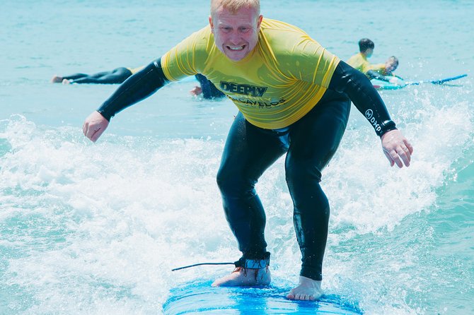 Surf Lesson on Praia de Carcavelos - Gear, wetsuits, and why included equipment is a travel win