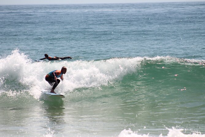 Surf lessons in the Algarve - Praia de Carvoeiro start, pickup options, and how the timing usually feels