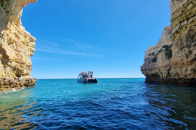 Tour to Benagil Caves and Coastline in Albufeira - Benagil Cave, cathedral style: skylight, golden walls, and timing reality