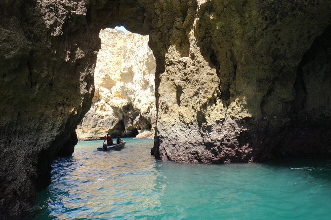 Tour to inside the Caves /Grottos the Ponta da Piedade -Lagos - The Portuguese-style boat ride, tight maneuvers, and real skipper skill