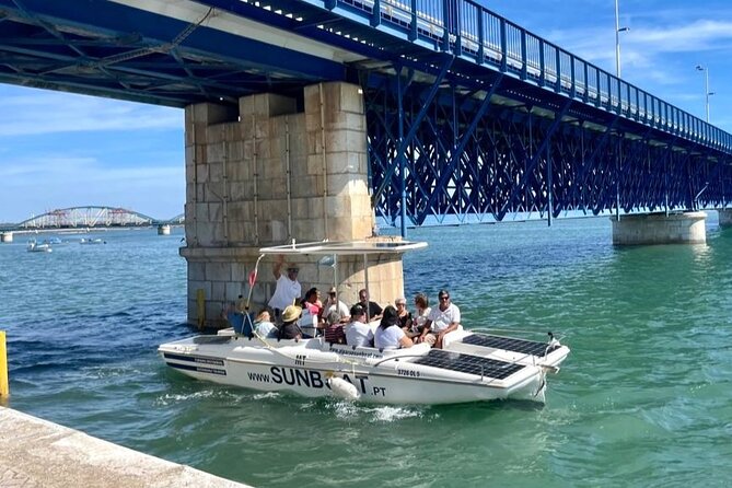 Visit Silves & Explore the Arade River | Eco-Friendly Solar Boat - Portimão riverside landmarks: the fish-canning factory museum and old industrial walls