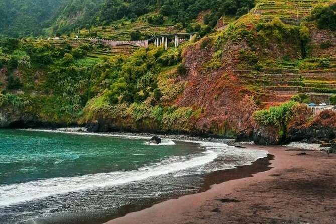 West Madeira Island Guided Tour & Fanal Mystic Forest - Seixal and the black sand beach: cliff views with a wild coastline feel